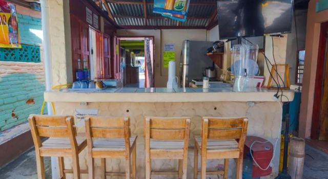 Кровать в общем номере Hostal Los Chamos