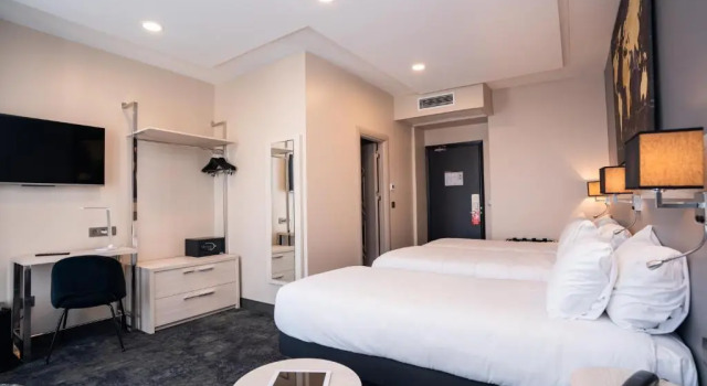 Трёхместный номер Hôtel Univers