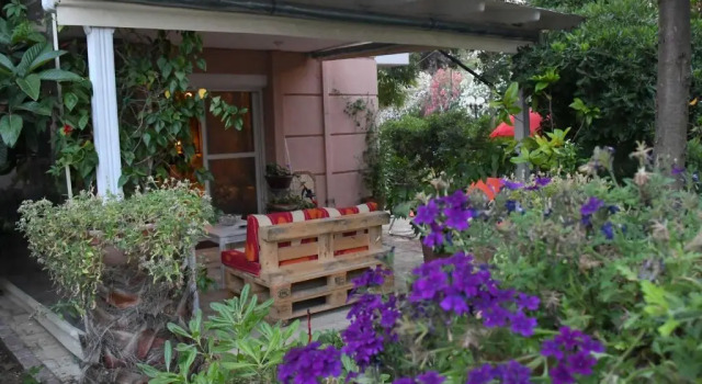 Студия Studio on the beach with private garden