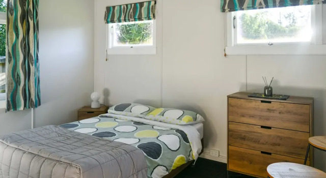 Кровать в общем номере Whangarei Falls Holiday Park