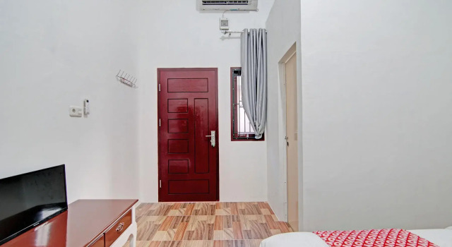 Номер Deluxe OYO 92946 Dekna Homestay Syariah
