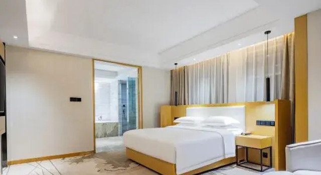 Люкс Deluxe New Beacon International Hotel (Enshi Cultural Center)