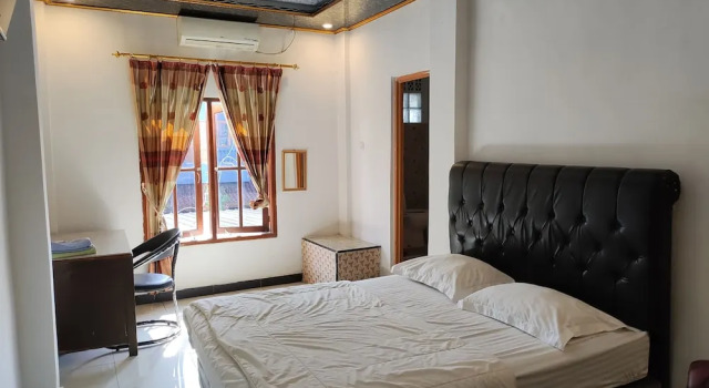 Camera Deluxe con balcone e con vista sulle montagne Penginapan Nurmega jaya