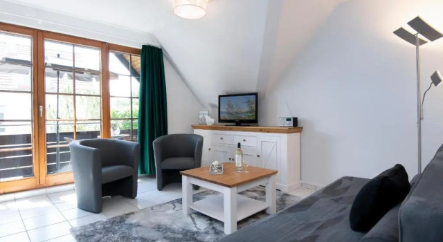 Alte Bergstrasse 6, Wohnung 10, Забронировать Отель Шарбойц Holstein Switzerland