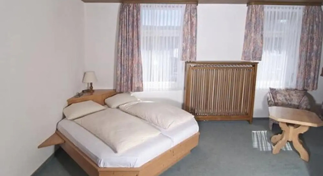 Кровать в общем номере Action Forest Hotel