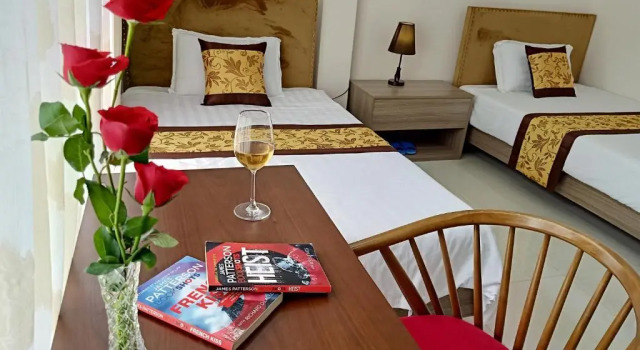 Четырёхместный номер Deluxe SAZI AMILA Nguyen Hue HOTEL