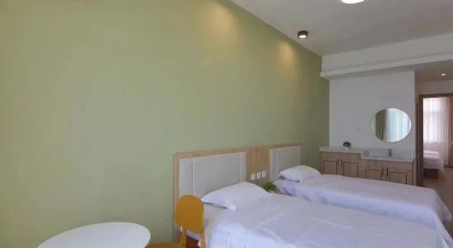 Кровать в общем номере Guanglu Island Golden Beach Resort