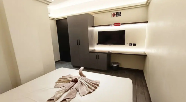 Номер Deluxe Nusantara Perintis Bogor By Reccoma