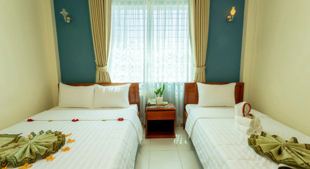 Трёхместный номер Deluxe Amigo Hotel