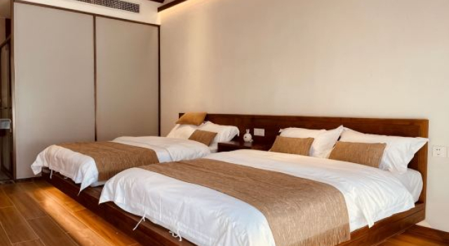 Кровать в общем номере Beijing Tingshui Mountain House Boutique B&B