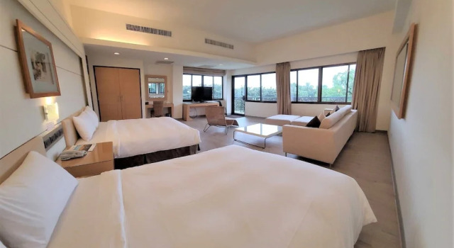 Четырёхместный номер Deluxe с видом на внутренний двор Dongxu Resort Hotel