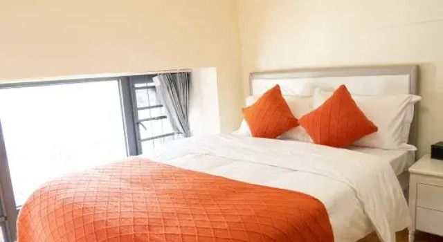 Люкс Дуплекс с 2 комнатами Yijiu Apartment (Kunming Railway Station Shuangqiao Night Market Style Street)