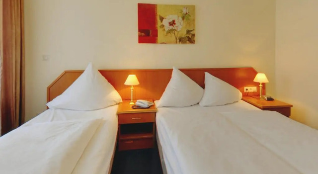 Четырёхместный номер Standard Hotel Lumen am Hauptbahnhof
