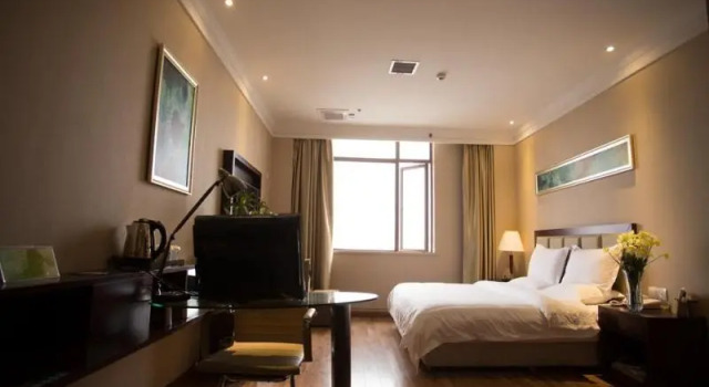 Люкс GreenTree Inn Hubei Huanggang Hong An Wal-Mart Plaza Business Hotel