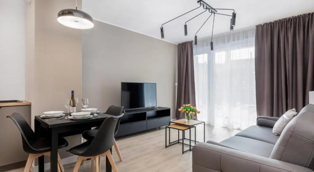Апартаменты Modern City Center Apartments by Noclegi Renters