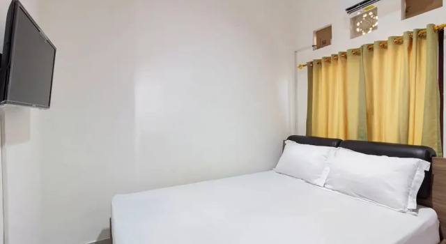 Номер Deluxe OYO 94091 Sn Guest House