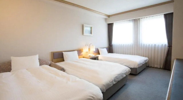 Standard Dreier Zimmer Hotel Suncrest