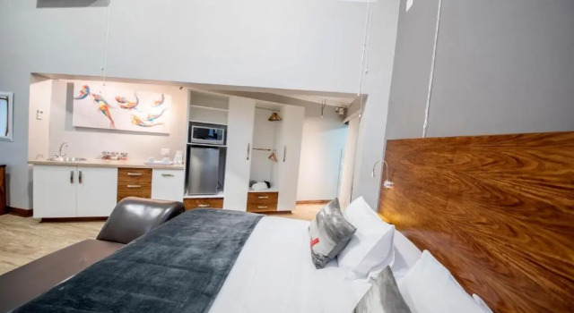 Clássico quarto Crisp Guest Rooms