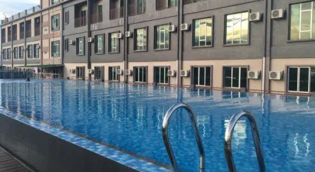 Кровать в общем номере Cenang View Hotel
