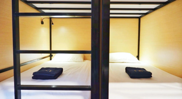 Łóżko w pokoju wieloosobowym Madina Inn