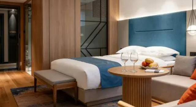 Кровать в общем номере Wenling Yadingwan Hotel