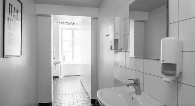 Кровать в общем номере Gamla Stan Apartments