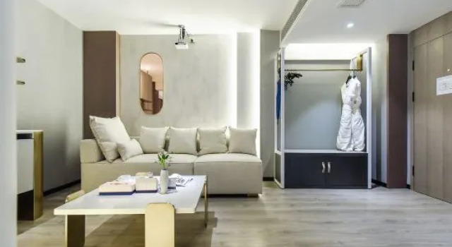 Люкс Business Kuanrong Suites Hotel (Liangjiang love sea shopping park)