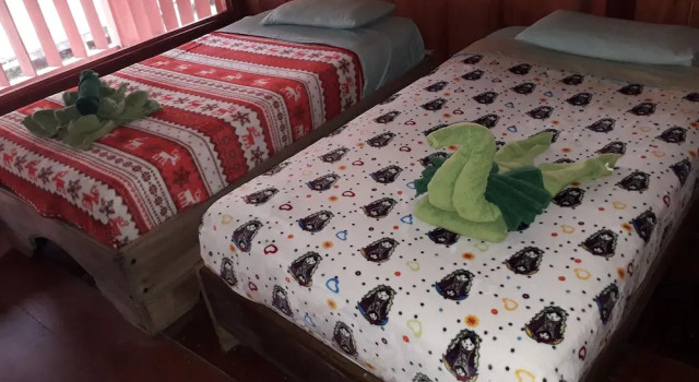 Pat în dormitor Kichwa Lodge