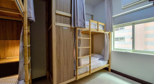 Кровать в общем номере Ta Li Wen B&B