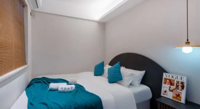 Люкс с 2 комнатами с балконом и рядом с пляжем Baoli JintinShanwei Bay Dongyue Boyang apartment