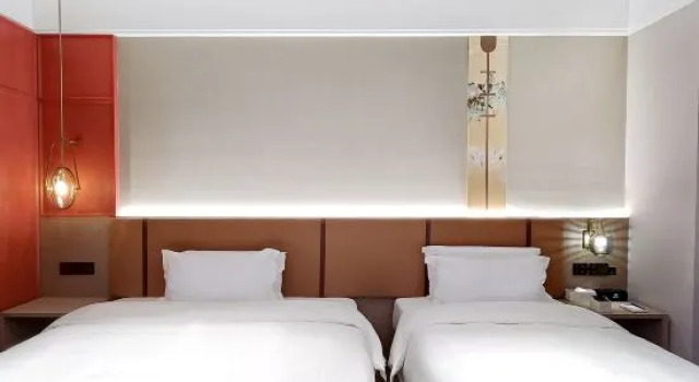 Семейный люкс Deluxe c 1 комнатой JOYCHENG HOTEL (Yichun Jingfa Avenue Branch)