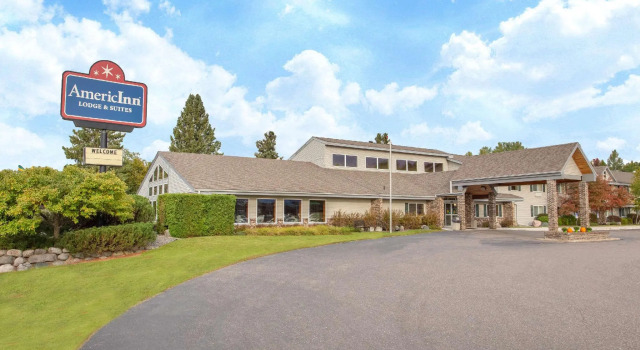 Кровать в общем номере AmericInn by Wyndham Rhinelander