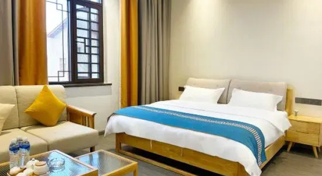 Семейный люкс Mille Wu'erheyuan Hotel