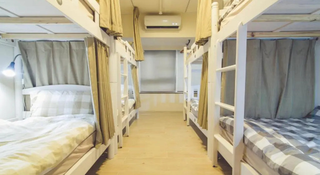 Кровать в общем номере Ahiruyah Guesthouse