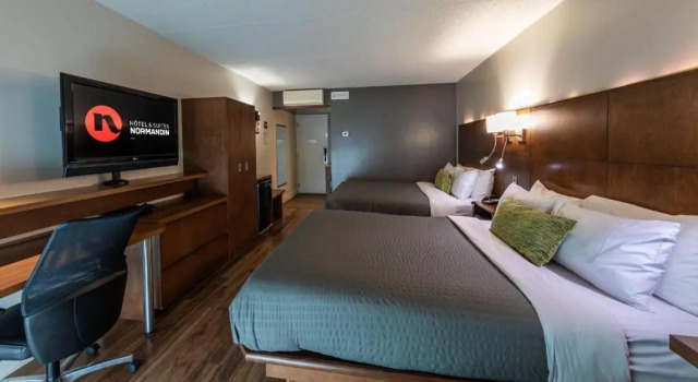 Четырёхместный номер Deluxe Hôtel & Suites Normandin Québec