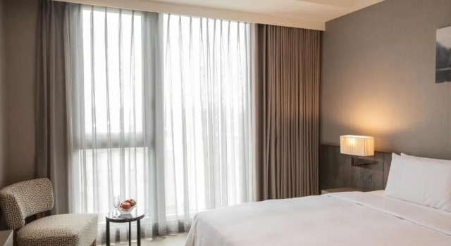 Номер Deluxe Jin Shi Hu Hotel