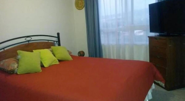 Семейные апартаменты с 2 комнатами с балконом Departamento Mancilla