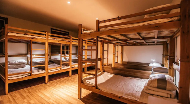 Кровать в общем номере Qufu International Youth Hotel