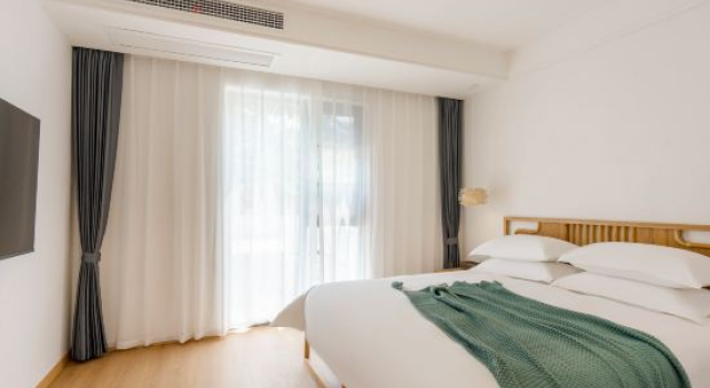 Кровать в общем номере с 6 комнатами Nanshan Bamboo Sea Homestay