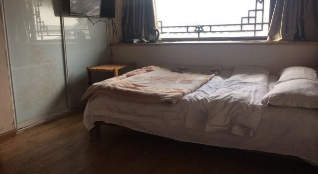 Simple Living Inn, Забронировать Отель Лицзян Юньнань, рядом с Улица Сквер-стрит Древнего города Даянь