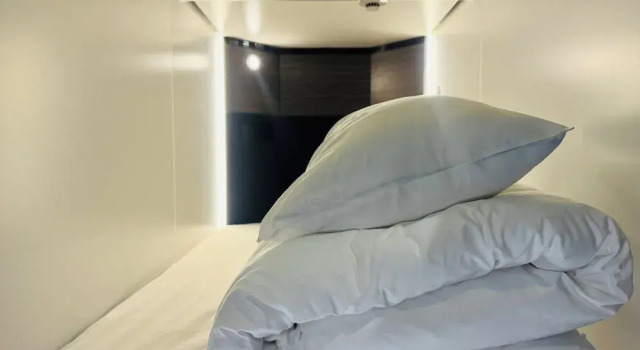 Кровать в общем номере (женский номер) Capsule Hostel Beppu Tower