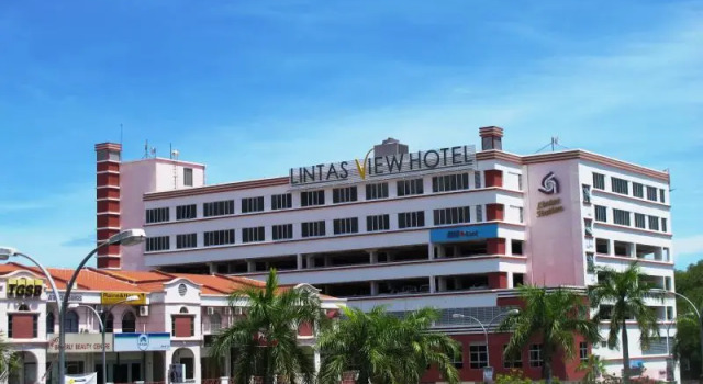 Кровать в общем номере Lintas View Hotel