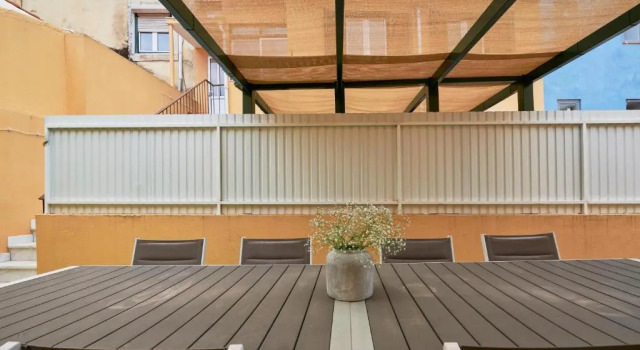 Апартаменты Renovated and Spacious Duplex Apartment With Patio, By TimeCooler