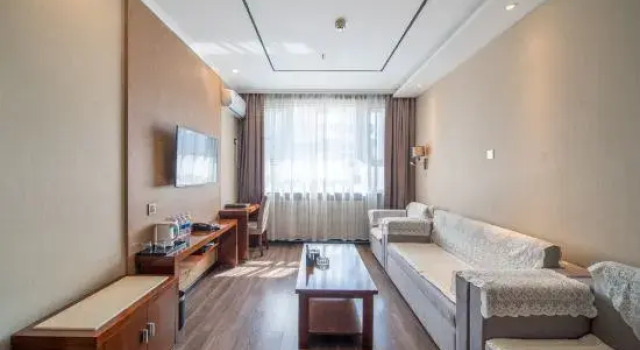 Люкс Deluxe Baodi Hotel (MM2 Shopping Center Xinjiang Military Region General Hospital)