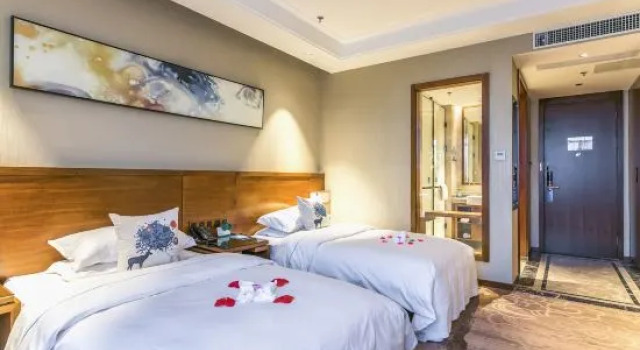 Люкс Deluxe Yantai Dexin International Hotel