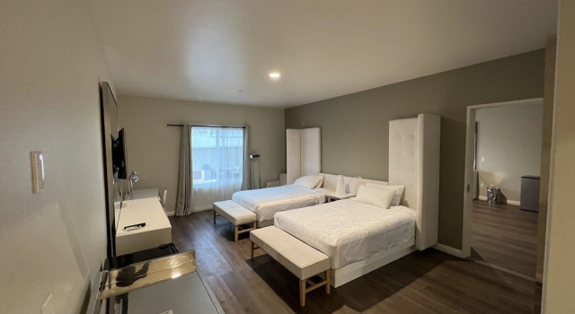 Четырёхместный номер Deluxe ASPIRE INN & SUITES Orange