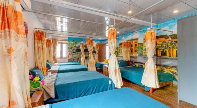 Кровать в общем номере Alley Garden Homestay Hoi An