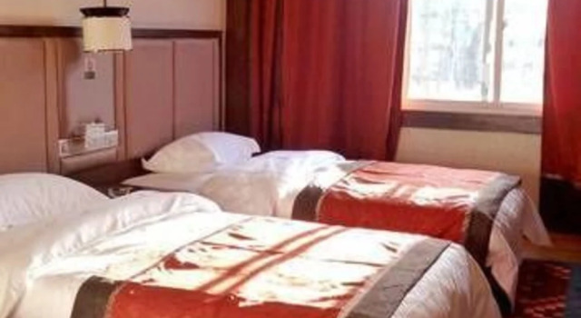 Heave Holiday Hotel, Boek Hotel Daocheng Sichuan