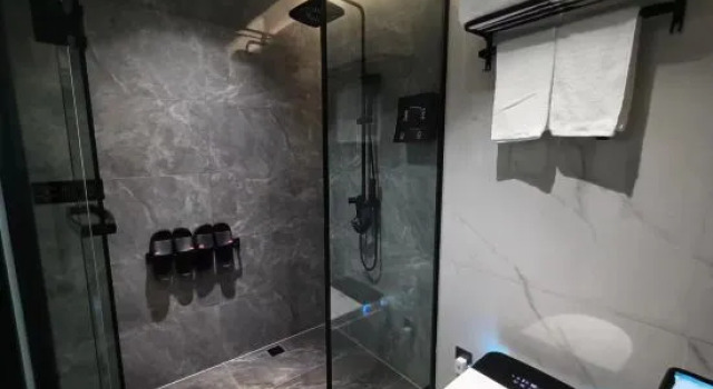 Кровать в общем номере Subai Cloud Hotel (Wuhu Tuojia Happy Song Huashan Road Subway Station)