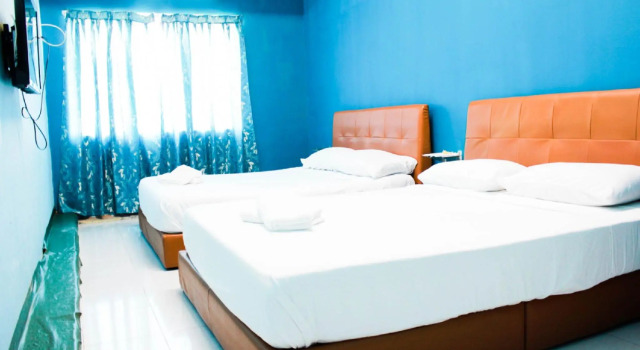 Четырёхместный номер Standard Q Hotel